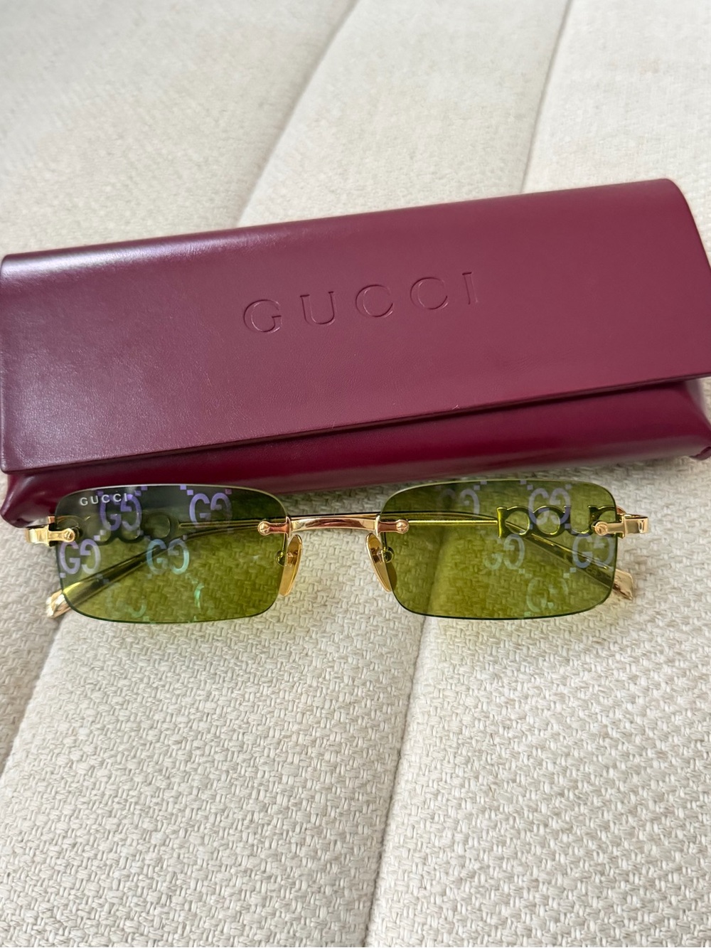 Gucci women’s Rimless Logo Sunglasses in Green